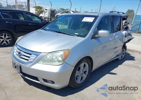 2010 Honda Odyssey Touring from USA, damaged, VIN 5FNRL3H99AB056234